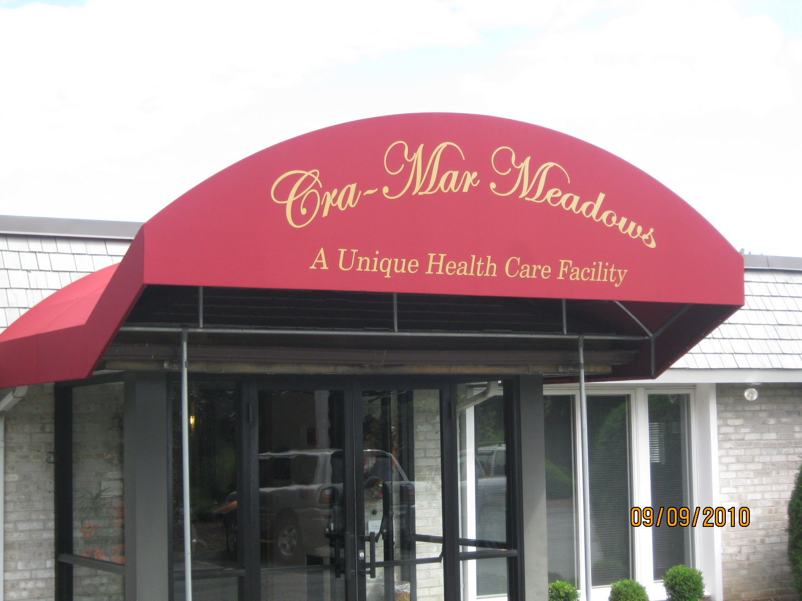 striped awnings outside of commercial building