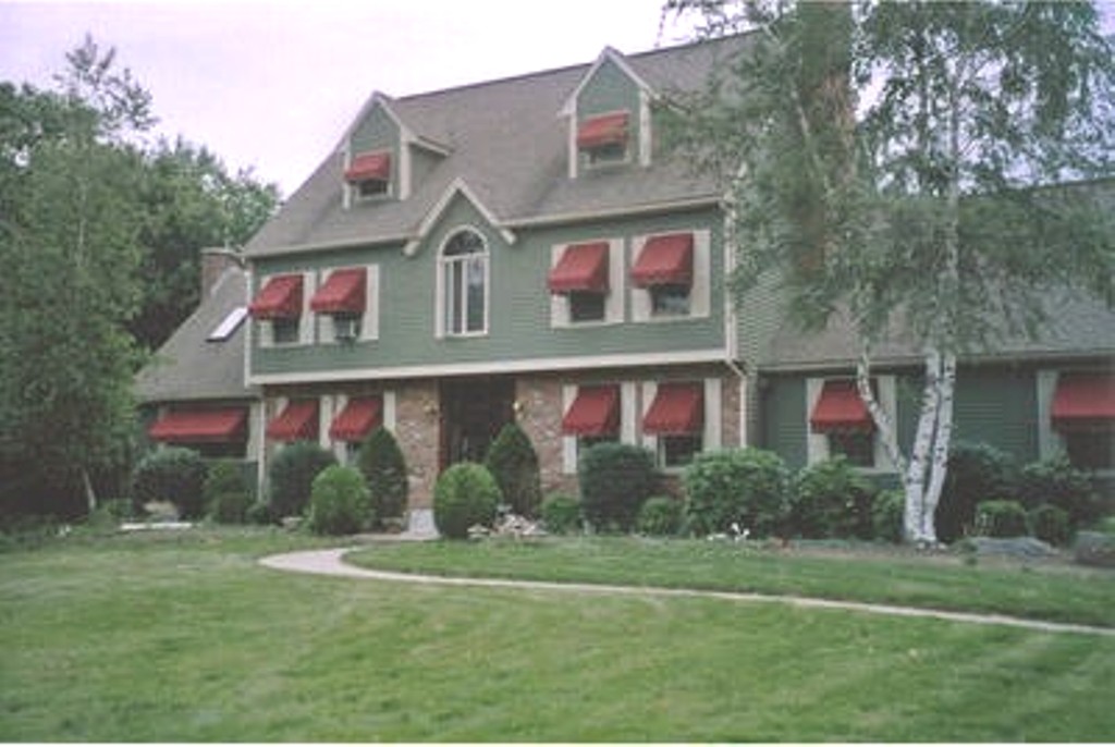 striped awnings outside of commercial building